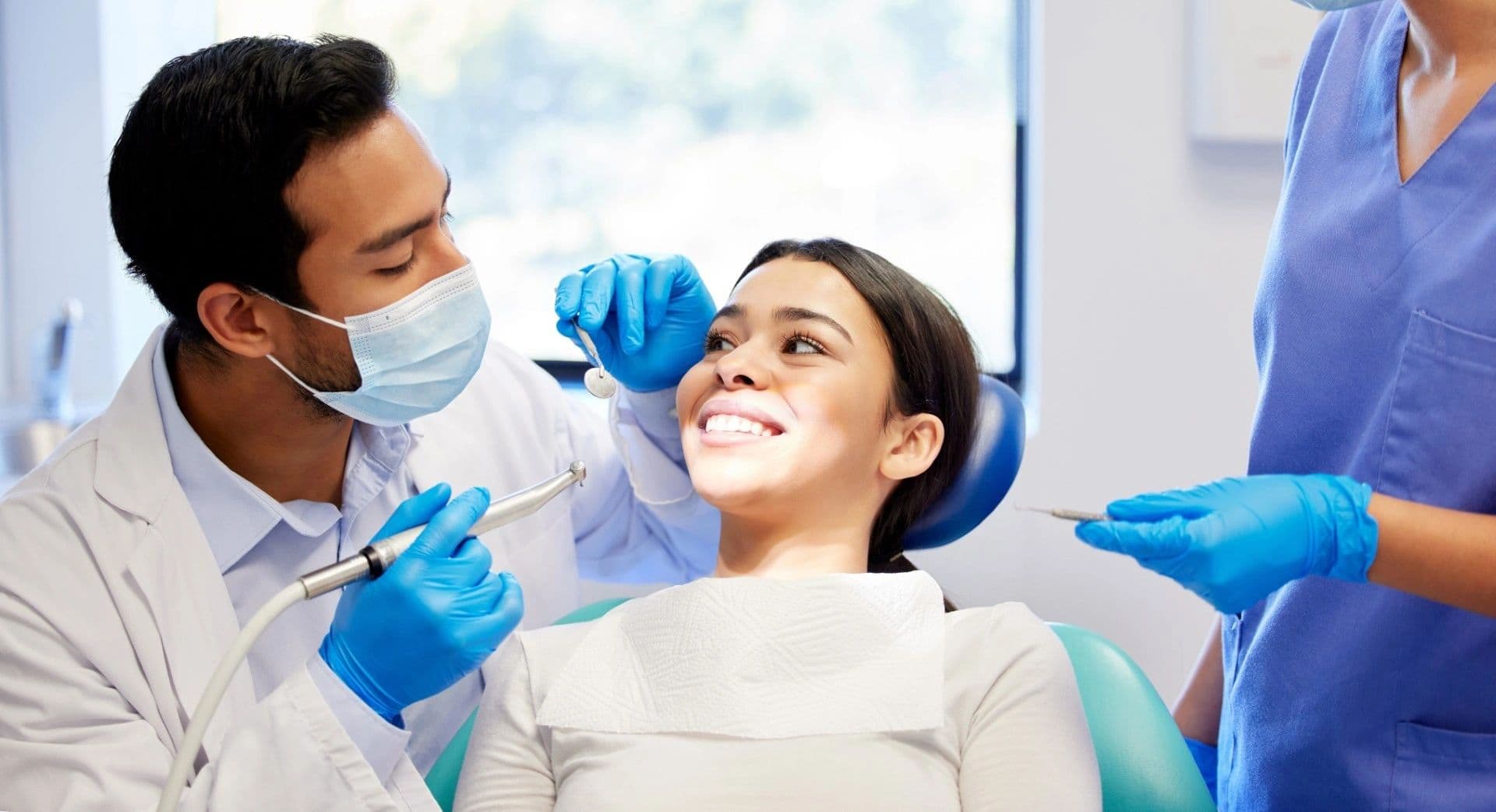 A patient smiling during a dental visit at Dentistry on Phillip in Waterloo